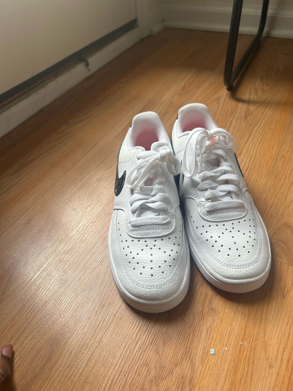 Nike White Sneakers with Black Swoosh